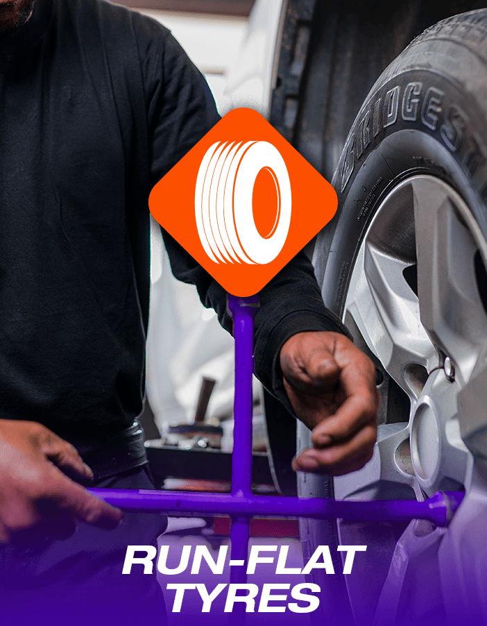 Tyres & More technician installing run flat tyres on a car.