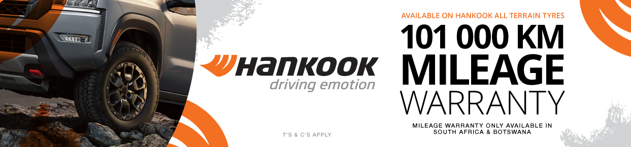 hankook mileage warranty: an SUV driving over rocky terrain