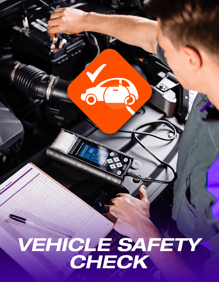 A Tyres & More technician performing a free vehicle safety check